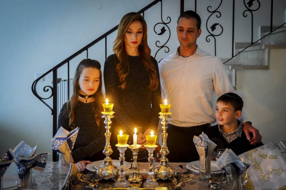 An AI image of a family celebrating shabbat