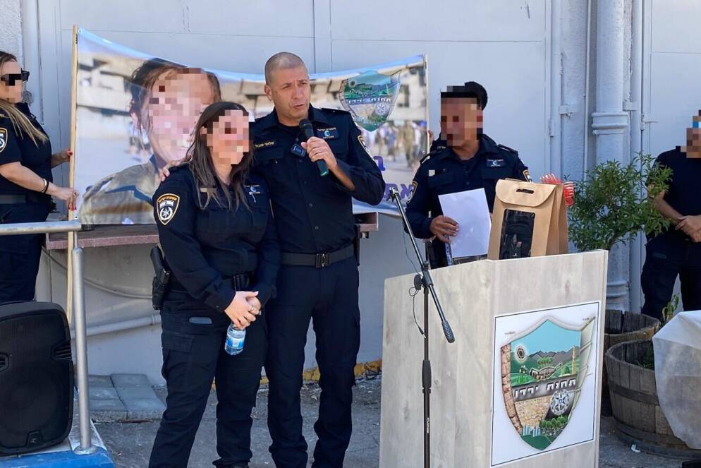 A group of people standing behind a podium.
