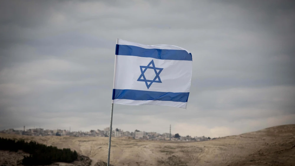 A blue and white Israeli flag.