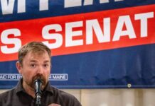 Graham Platner speaks to voters at a town hall at the Elks Lodge 188 on June 7, 2026, in Portland, Maine.