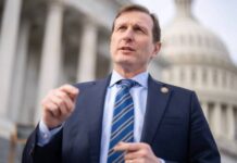 Rep. Dan Goldman talks with a reporter outside the U.S. Capitol on December 18, 2025.