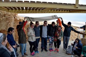 From left: Kelsey Kabinoff, Danielle Yaeger, Jeff Hozias, Mallory Sommers and Samantha McIsaac celebrate their B’nai Mitzvot on top of Masada. Participants were able to become a B’nai Mitzah if they had not done so already. Photos by Hannah Giterman