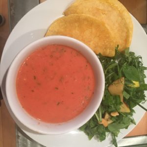 Mexican tomato soup with a side of quesadillas and salad