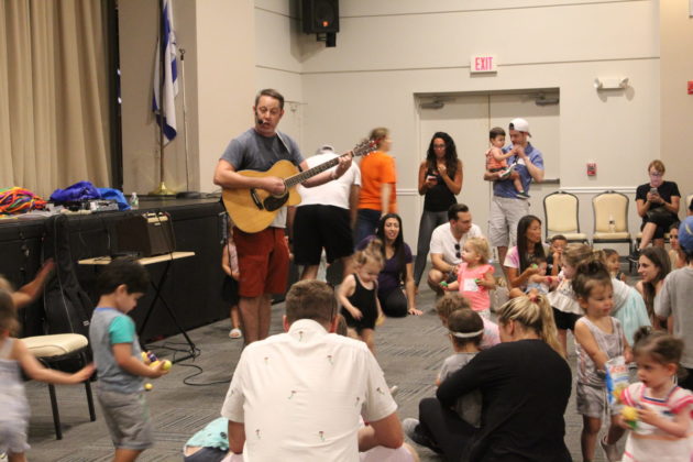 Roots by Ruark performs surrounded by families