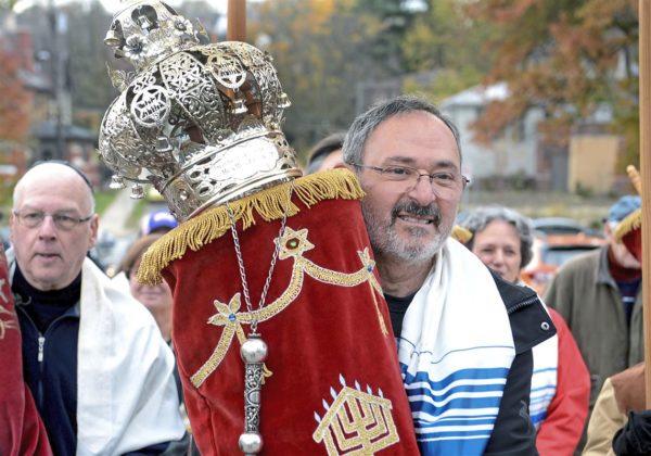 Richard Gottfried carrying a Torah