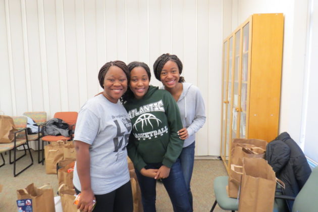 JFS staff member Mildred Johnson with her daugthers