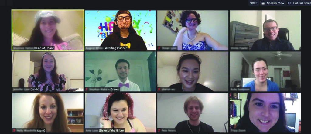 Twelve smiling people on a Zoom call