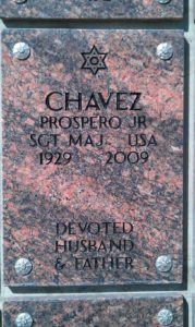 Engraved on a red marble tombstone with a Star of David at the top: "CHAVEZ, PROSPERO JR"