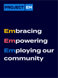 The e-banner has a dark blue background and white text and reads: "Embracing, Empowering, Employing our community"