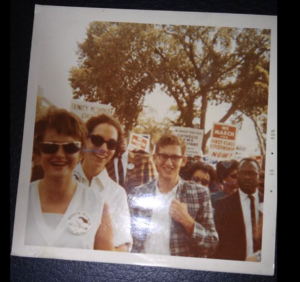 A Polaroid picture shows a young Stein with friends at the March on Washington